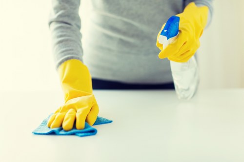 Curtain cleaning process in Raynes Park with careful inspection and treatment