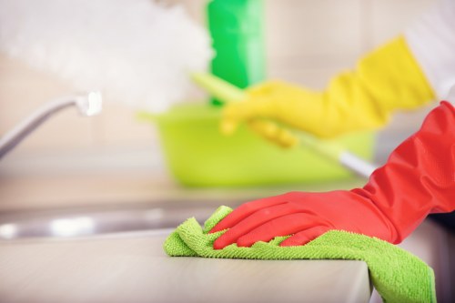 Professional carpet cleaning service removing dirt from a hallway carpet in Raynes Park
